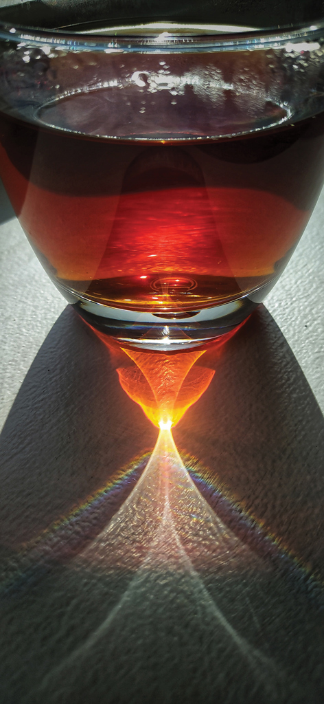 The curved surface of a glass of tea thumbnail