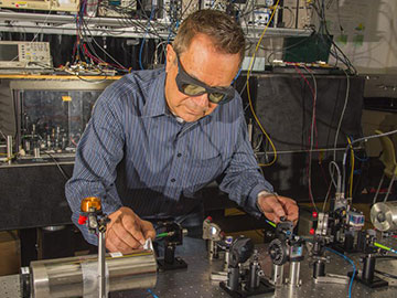 Dave Howe of NIST with laser equipment