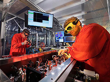 scientists in laser lab