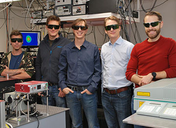 Five scientists in the lab