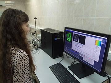photo of woman in lab with computer