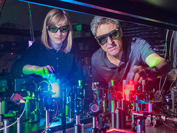 scientists in laser lab