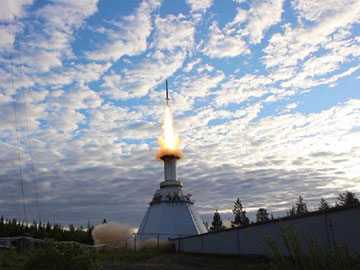 Photo of ascending rocket