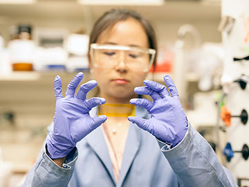 Grace Han with sample of phase-change material